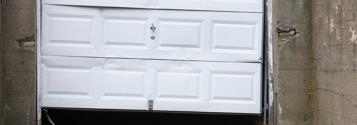 Garage Door Got Hit By A Car Dent Removal in Plantation, FL