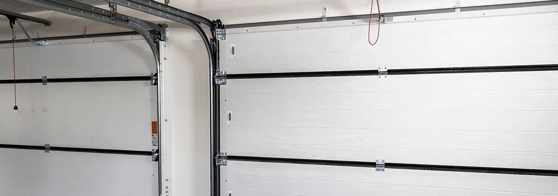 Fix Folding Garage Door Jerking in Plantation, Florida