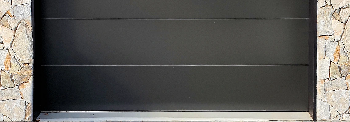 Overhead Black Garage Door Installation in Plantation, Florida