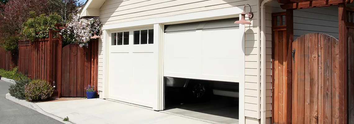 Fix Metal Garage Door Jerking in Plantation, Florida